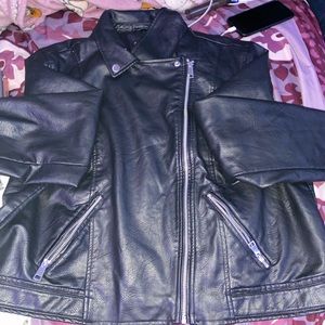 Leather jacket worn once!! Great condition and still gives a fresh jacket look!